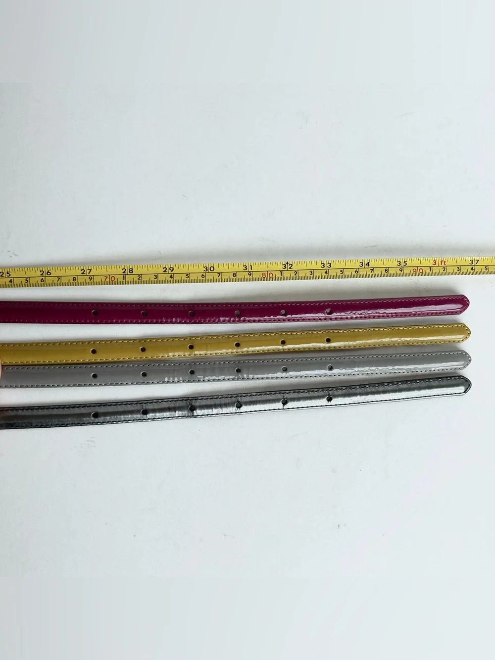 4 X Uniqlo lacquered leather skinny belt